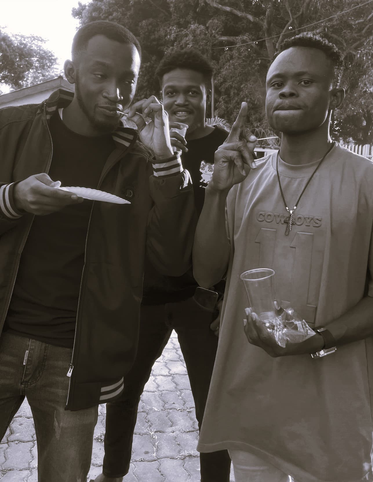 Dem boys of faith — Paper plates, plastic cups, a cross on a chain and one finger up. From the Jedidiah Gabriel (Jedshock) gallery.